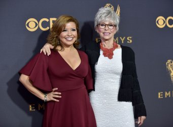 Justina Machado (L) and Rita Moreno attend the 69th annual Primetime Emmy Awards in Los Angeles