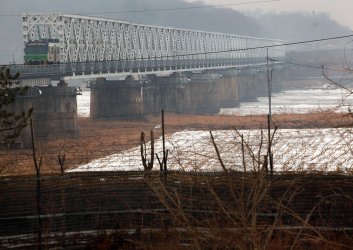 A barbed wire fence guards the Freedom Bridge connecting South Korea to the DMZ in Seoul