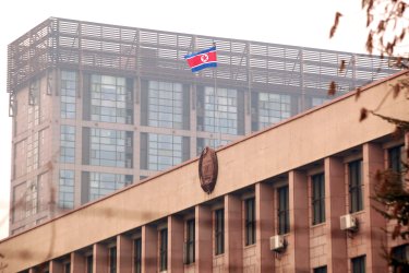 The North Korean flag flies over the North Korean embassy in Beijing