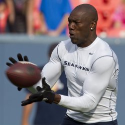 Seahawks Receiver Owens Warms Up at Sports Authority Field at Mile High in Denver