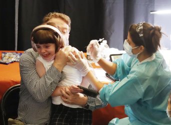 Children Receive COVID-19 Vaccinations in New York