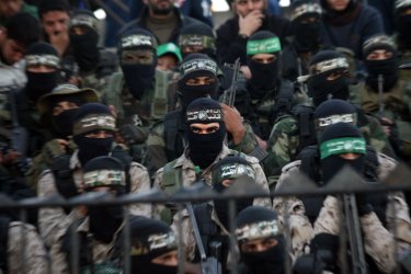Palestinians Take Part in a Rally Ahead of the 29th Anniversary of Hamas