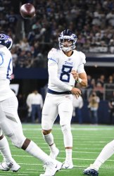 Tennessee Titans quarterback Marcus Mariota throws against the Dallas Cowboys