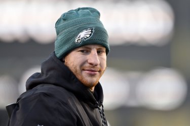 Eagles' Carson Wentz stands on the sidelines