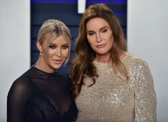 Caitlyn Jenner and Sophia Hutchins attend Vanity Fair Oscar Party