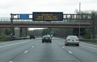 Highway Sign Encourages People to Stay at Home during the Coronavirus Pandemic in Washington, D.C.