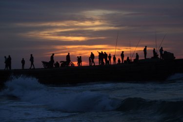 Palestinians Enjoy a Beach Sunset in Gaza