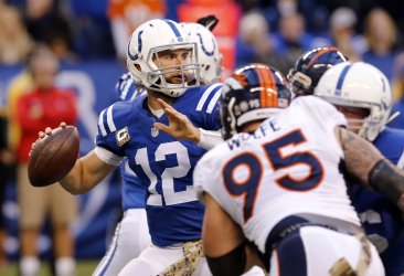 Colts QB Andrew Luck throws under pressure