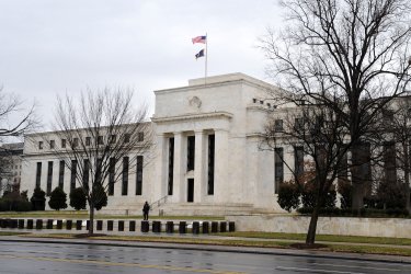 The Federal Reserve board members debate cutting key interest rate in Washington