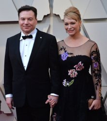Mike Myers and Kelly Tisdale arrive for the 91st Academy Awards