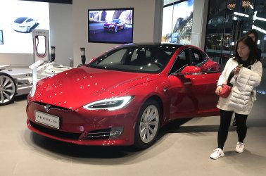 Chinese visit Tesla's new showroom in Beijing, China
