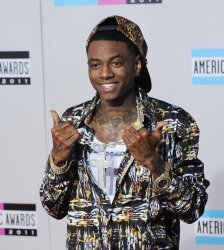 Rapper Soulja Boy arrives at the 39th American Music Awards in Los Angeles