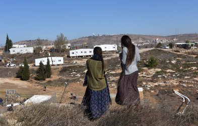 Israeli Settlers Stand On A Hill In Amona Settlement, West Bank