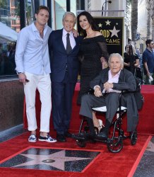 Michael Douglas is honored with a star on the Hollywood Walk of Fame in Los Angeles.