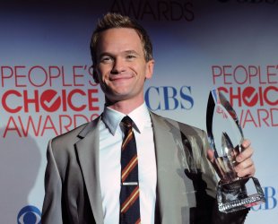 Neil Patrick Harris garners an award at the 38th annual People's Choice Awards in Los Angeles