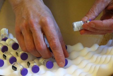 France Begins Covid-19 Vaccinations for Seniors in Paris