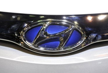 The logo for Hyundai on display at the Chicago Auto Show