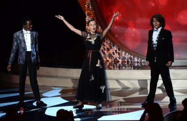 Caleb McLaughlin, Millie Bobby Brown and Gaten Matarazzo onstage at the 68th Primetime Emmy Awards in Los Angeles