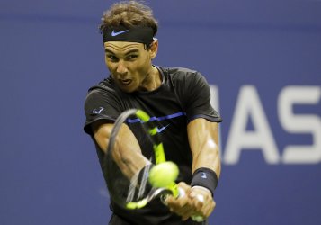 Rafael Nadal hits a backhand at the US Open