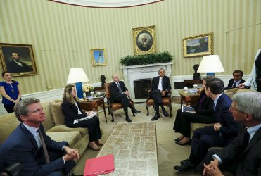 Barack Obama receives a briefing on the ongoing response to the Zika virus