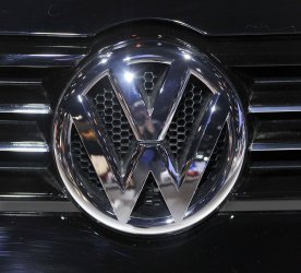 The logo for Volkswagen on display at the Chicago Auto Show