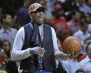 Rodman brings out game ball in Chicago
