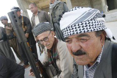 Kurdish Peshmerga Volunteer to Fight Against the Islamic State Near Mosul City