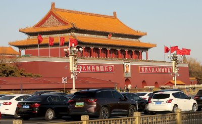 Traffic Passes Tiananmen Square in Beijing, China
