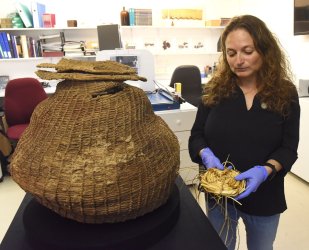 The Israel Antiquities Authority Unveils An Ancient Woven Basket From The Judean Desert