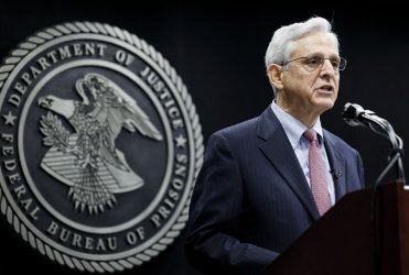 U.S. AG Garland swears in the new Bureau of Prisons Director Peters