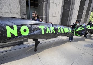 Protesters Demonstrate against Oil Sands Production and Keystone Pipeline in Chicago