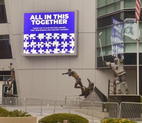Staples Center sign thanks doctors, nurses, first responders and grocery wotkers in Los Angeles