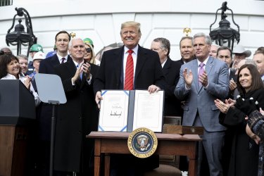 President Trump participates in a signing ceremony for the United States-Mexico-Canada Trade Agreement.