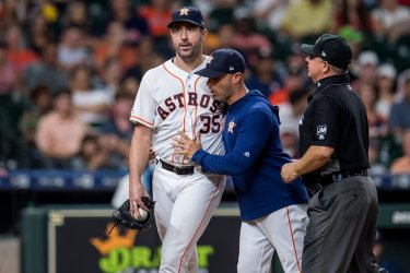 Astros pitcher Justin Verlander leaves the field after being ejected