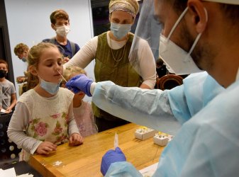 An Israeli Girl Takes A COVID-19 Antigen rapid test In Jerusalem