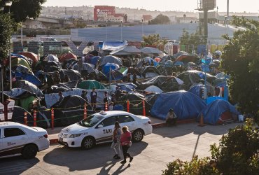 Asylum Seekers Wait at the Border