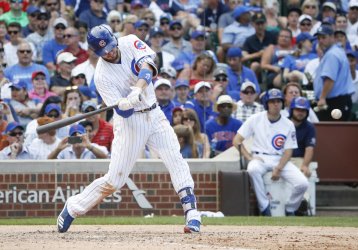 Cubs Kris Bryant hits a solo home run against the Pirates in Chicago