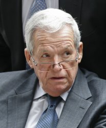 Former U.S. House Speaker Dennis Hastert looks on while leaving after his sentencing Hearing in Chicago
