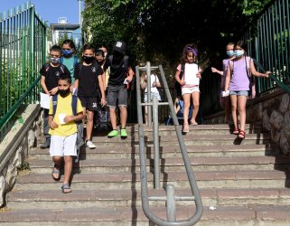 Israeli Children Wear Protective Mask as They Return to School