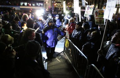 Dueling protests for and against the NYPD face off outside City Hall