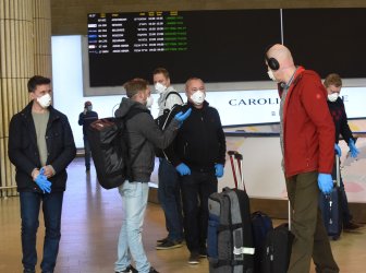 Men Wear Masks And Gloves In Ben Gurion Airport, Israel