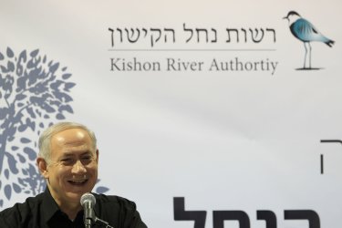 Israelie PM Netanyahu speaks during corner stone laying ceremony at Kishon stream fishing wharf in Haifa