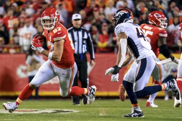 Chiefs Travis Kelce is Tackled By Broncos Kenny Young