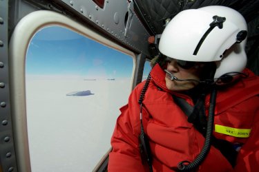 Secretary Kerry looks out at an Iceberg During a Helicopter Tour in McMurdo Sound, Antarctica