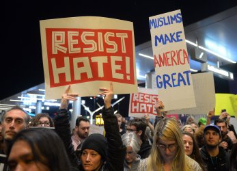 Hundreds protest in opposition to Trump's Muslim ban order at LAX