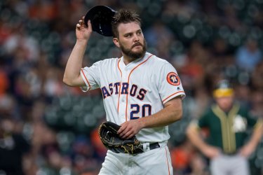 Astros starting pitcher Wade Miley leaves the game