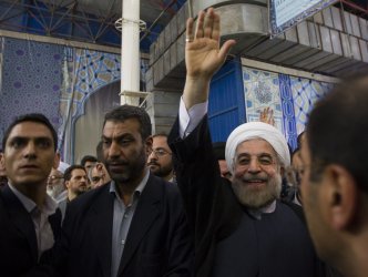 Iran's new president Hassan Rouhani pays a visit to the shrine Ayatollah Khomeini