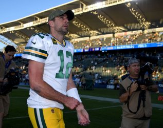 Green Bay Packers' quarterback Aaron Rodgers comes off the field after game against the Los Angeles Chargers