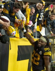 Steelers Najee Harris Celebrates with Fans After Win