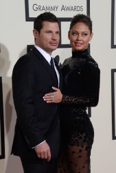 Nick Lachey and Vanessa Lachey arrive for the 58th annual Grammy Awards in Los Angeles